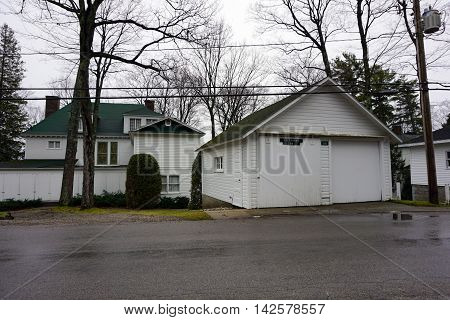 WEQUETONSING, MICHIGAN / UNITED STATES - DECEMBER 22, 2015: The garage of a home on Beach Road in Wequetonsing, Michigan.