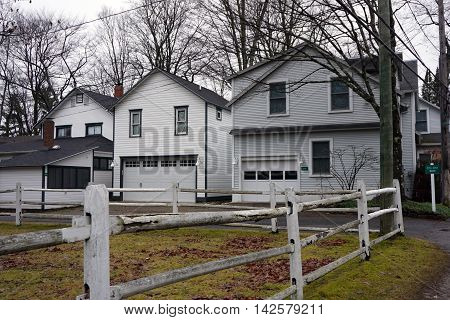 WEQUETONSING, MICHIGAN / UNITED STATES - DECEMBER 22, 2015: Homes with attached garages in Wequetonsing, Michigan.