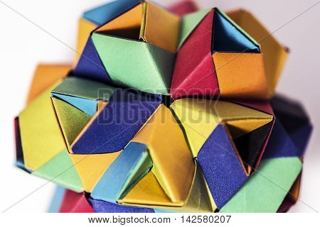 origami paper composition white background studio closeup