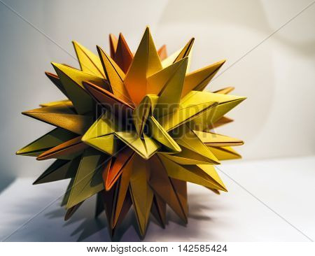origami paper composition white background studio closeup