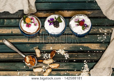 Beautiful Muffins With Berries On Wooden Background Nuts Honey