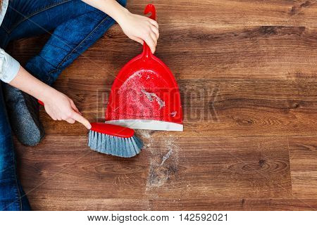 Cleaning Woman Sweeping Wooden Floor