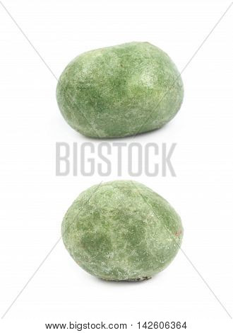 Green wasabi coated peanut isolated over the white background, set of two different foreshortenings