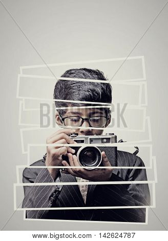 Beautiful child (kid boy) wearing classes - photographer holding a instant camera indoor isolated on white - Abstract Collage