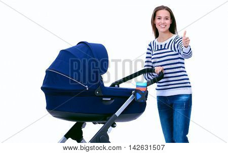 Full length portrait of a mother with a stroller showing ok, isolated on white background
