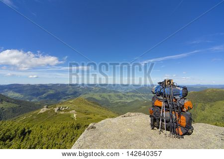 Camping with backpacks in the mountains with views of the mounta