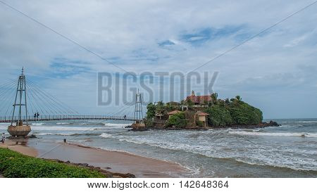 Buddhist Temple on the island Bridge to the island with the temple