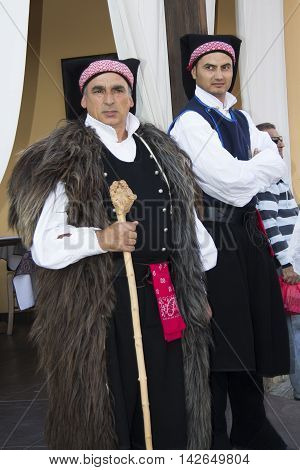 QUARTU S.E., ITALY - September 15, 2012: Parade of the Wine Festival 2012 - Sardinia - group of people in traditional Sardinian costume