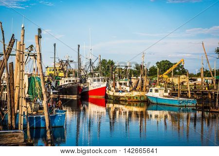 MIDDLETOWN NEW JERSEY- AUGUST 6 - Commercial fishing boats on Shoal Harbor on August 6 2016 in Middletown NJ.