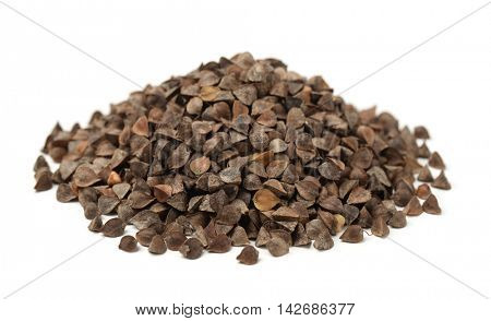 Pile of unhulled buckwheat isolated on white