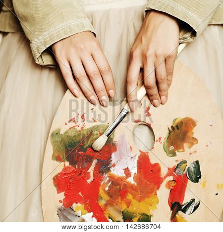 My muse art palette in female hand