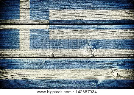 flag of Greece painted on old grungy wooden background: 3d illustration