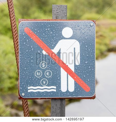 No Coins in the Water - Forbidden Sign in Iceland