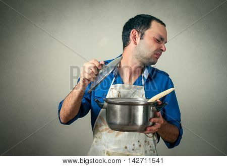 man with the meal in pan and bad smell