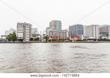Bangkok, Thailand - June 5, 2016: Siriraj Hospital view from the other side of Chao Phraya River on cloudy day. It is the oldest and the most famous hospital in Thailand and part of Mahidol university