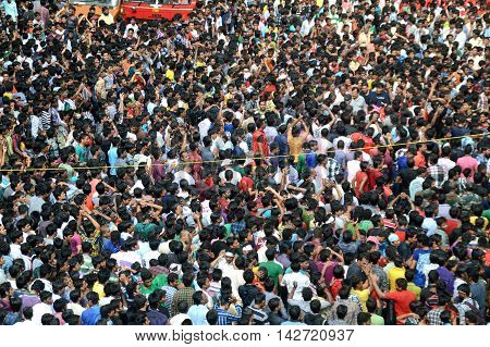AMRAVATI, MAHARASHTRA, INDIA - AUGUST 29 : Crowd of young People enjoying 