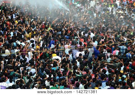 AMRAVATI, MAHARASHTRA, INDIA - AUGUST 29 : Crowd of young People enjoying 