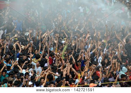AMRAVATI, MAHARASHTRA, INDIA - AUGUST 29 : Crowd of young People enjoying 