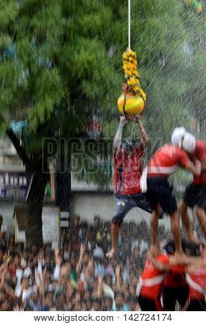 AMRAVATI, MAHARASHTRA, INDIA - AUGUST 29 : Crowd of young People enjoying 