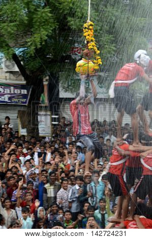 AMRAVATI, MAHARASHTRA, INDIA - AUGUST 29 : Crowd of young People enjoying 