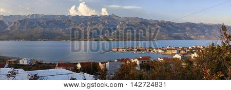 Town of Vinjerac in the sunset and Velebit mountain with Paklenica national park, Croatia - panoramic view