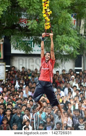 AMRAVATI, MAHARASHTRA, INDIA - AUGUST 29 : Crowd of young People enjoying 