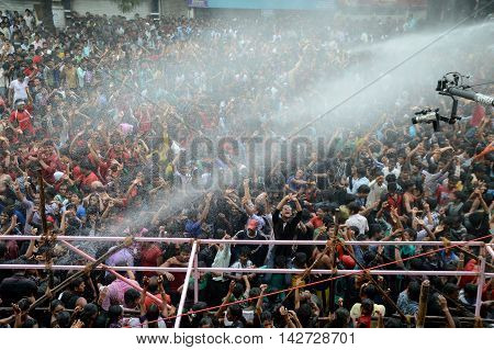 AMRAVATI, MAHARASHTRA, INDIA - AUGUST 29 : Crowd of young People enjoying 