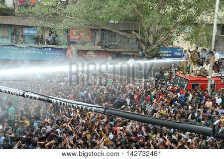 AMRAVATI, MAHARASHTRA, INDIA - AUGUST 29 : Crowd of young People enjoying 