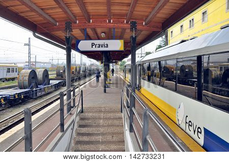 Pravia Spain - June 19 2010: Passenger train stands at the station. Railway in Pravia connects Hendaye France and Ferrol northwest Spain has meter gauge track.
