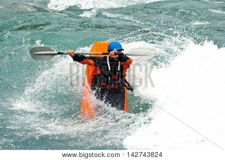 August kayak trip on the waterfalls of Norway