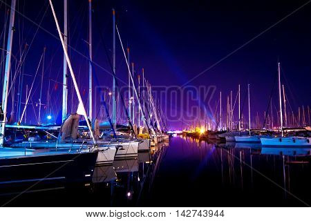 Yachts at a wharf at night in Turkey