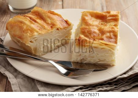 Traditional Georgian achma khachapuri on a plate