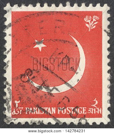 MOSCOW RUSSIA - CIRCA JUNE 2016: a post stamp printed in PAKISTAN shows Star and Crescent Moon circa 1961.
