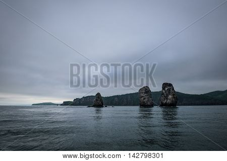The Three Brothers, a famous rock formation in the Avacha Bay area near Petropavlovsk-Kamchatsky, Kamchatka, Russia
