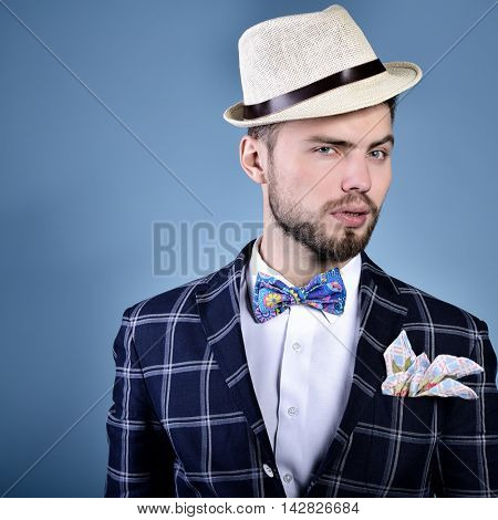 Compere. Man master of ceremonies in hat over blue background