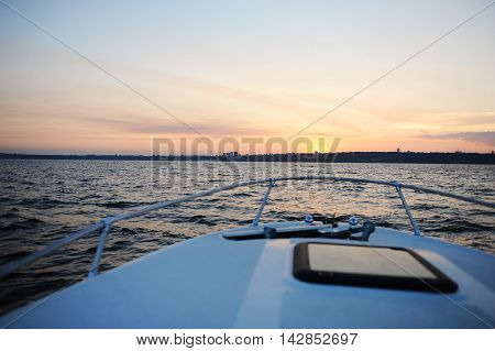Summer sanset on the Volga river. Boat trip