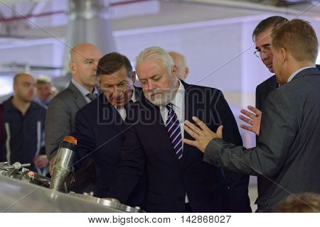 ST. PETERSBURG, RUSSIA - AUGUST 11, 2016: Vice-governor of St. Petersburg Igor Divinsky (center) during his working visit to the Heineken brewery. It can produce over 5 millions HL of beer per year