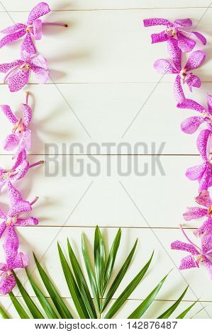 Palm Leaf And Orchid Flowers Arranged With White Wood Background - Summer Concept,copy Space