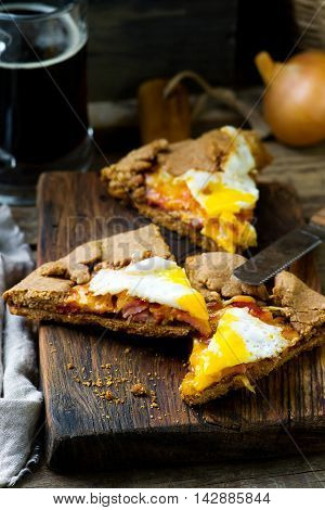 gallet with onion ham and egg . style rustic. selective focus