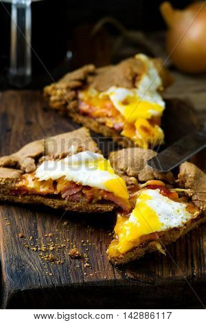 gallet with onion ham and egg . style rustic. selective focus