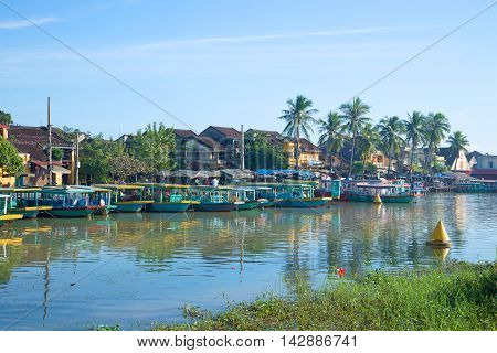 HOI AN, VIETNAM - JANUARY 04, 2016: Early morning on the Thu Bon river. The historic town centre of Hoi An. Historical landmark