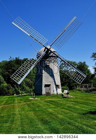 Middletown Rhode Island - July 16 2015: 1812 Robert Sherman shingled smock windmill at the Prescott Farm historic site