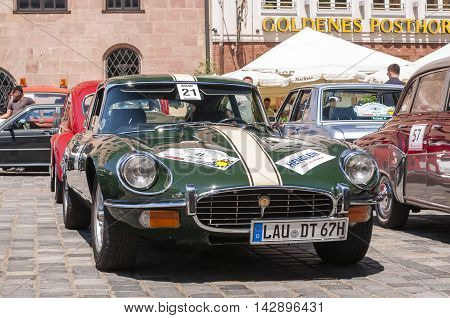 Nurnberg Bavaria / Germany - July 19th 2014: green Jaguar E Type at Sud - Rallye- Historic event in Nurnberg