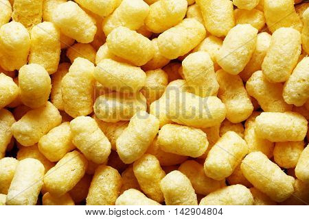 Yellow corn sticks closeup. Backgrounds and textures