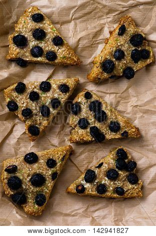 wholegrain scone with blueberry . selective focus