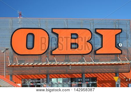 CIRCA AUGUST 2016 - GDANSK: sign of OBI against blue sky. OBI is the largest do it yourself retailer in Europe. It was founded in 1970 in Hamburg, Germany.