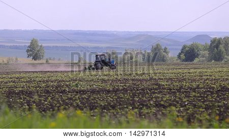 Russian Farmer is working on his land
