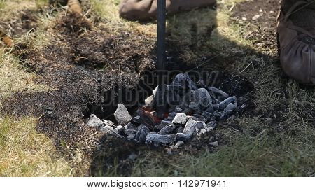 Red-hot grey coal In the earth closeup