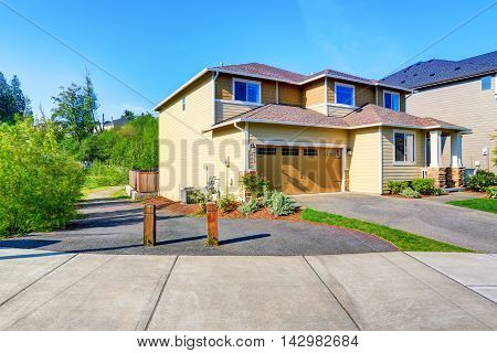 Nice Curb Appeal Of Luxury Beige House.