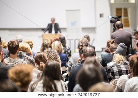 Speaker Giving A Talk In Conference Hall At Business Event. Audience At The Conference Hall. Busines